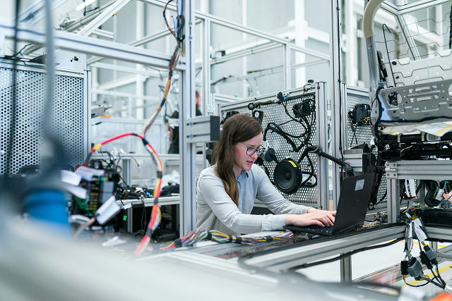 Engineer working with industrial robotics